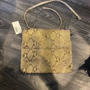 Crossbody pocketbook by Chicos NWT 9 1/2” x 10 1/2” size bag magnetic closure